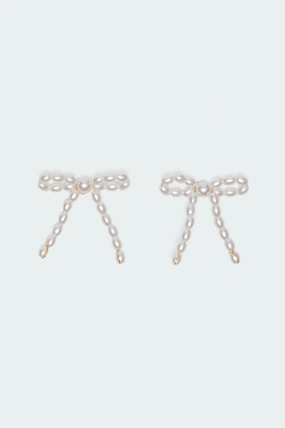 Pearl Bow Stud Earrings - Image 2